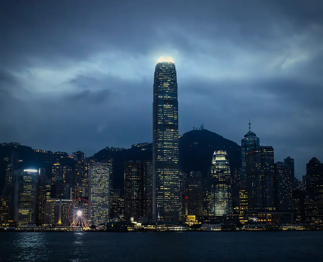 Two IFC under storm clouds at dusk