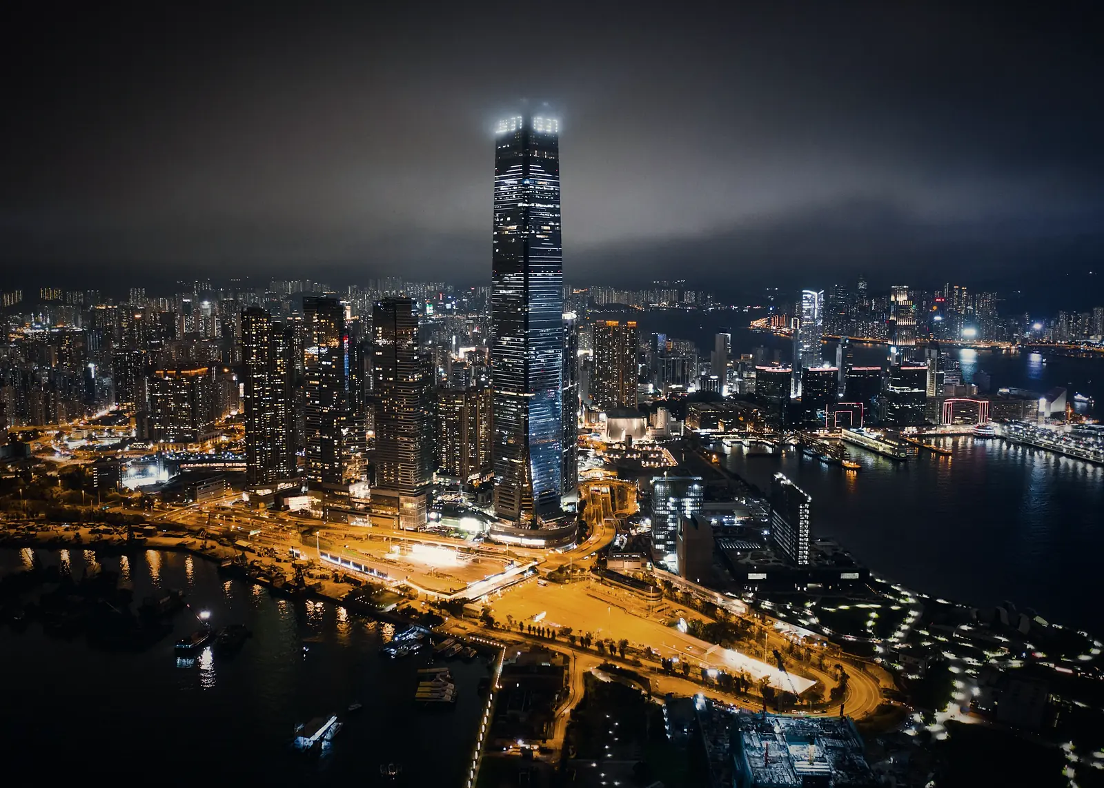 Kowloon at night across Victoria Harbour